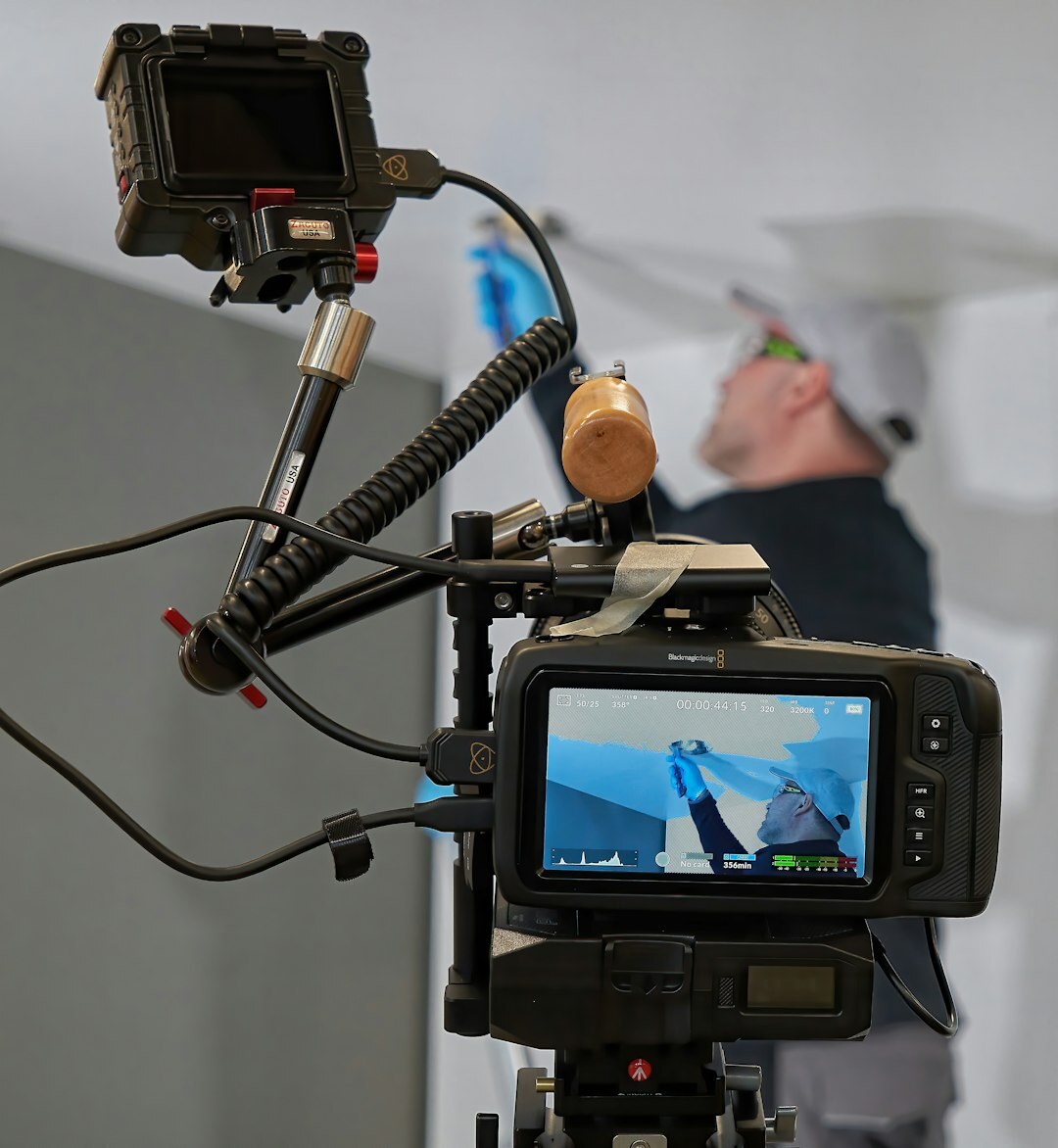 Finnish male camera operator filming in a television studio