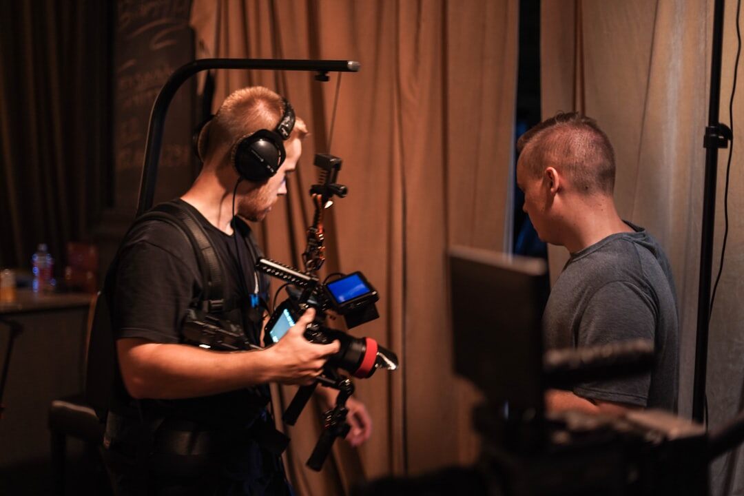 Production team reviewing a shot list before a live show